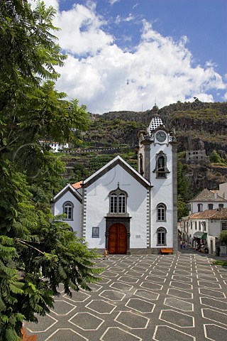 Terraced vineyards overlooking the church in Ribeira Brava Madeira