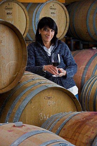 Loredana Addari in the barrel cellar of Podere   Ruggeri Corsini   Bussia Monforte dAlba   Piedmont Italy    Barolo