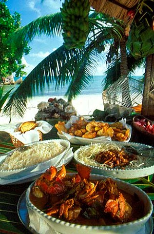 Crab curry deep fried sea food and  aubergines Les Rochers restaurant  Praslin Seychelles Indian Ocean