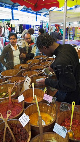Mediterraneanherbs and spices on sale at Greenwich covered market London England