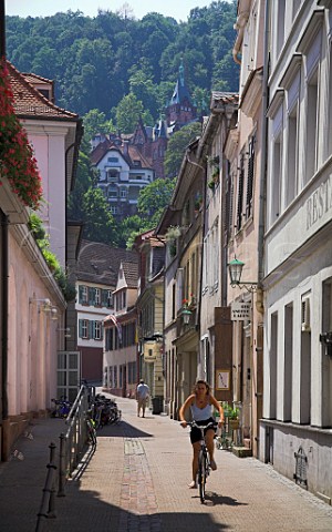 Cyclist in a side street of Heidelberg   BadenWrttemberg Germany