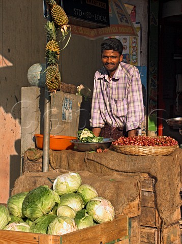 Indian man selling fruit and vegetables Chennai   Madras India