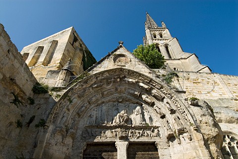 Stone arch and bell tower of the historic monolithic   church on the Place de lEglise Stmilion Gironde   France