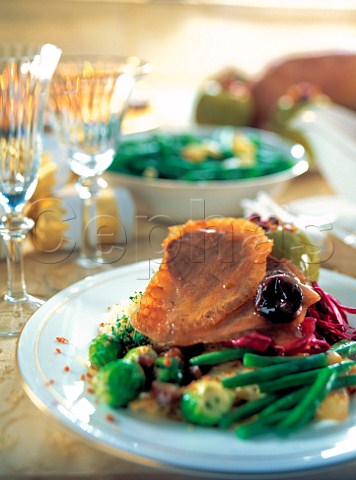 A festive spread of roast goose and side dishes