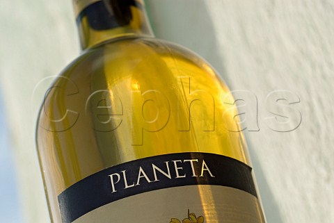Label on sunlit bottle of 2005 Planeta Alastro Sicilian white wine