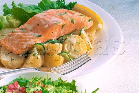 Salmon with new potatoes and salad