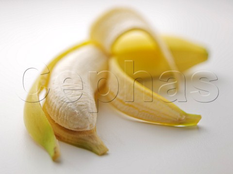 Half peeled banana