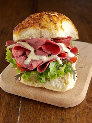 Salt beef and salad in a crusty white roll