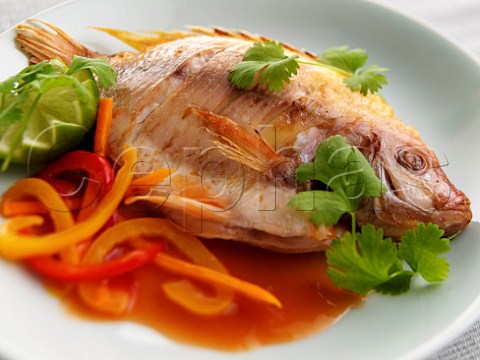 Baked parrot fish in sweet and sour sauce