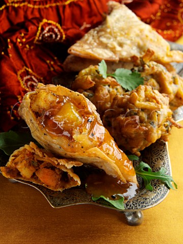 Samosas and bhajis with mango chutney