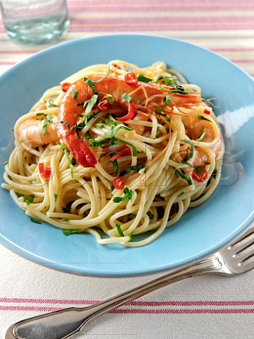 Plate of spaghetti with chilli prawns