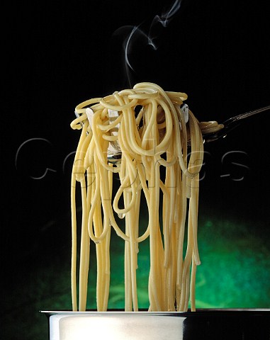 Spaghetti hanging from a fork