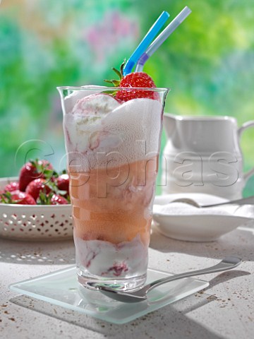 Glass of strawberry icecream soda