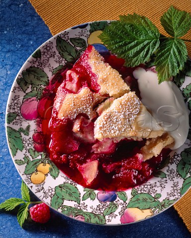Raspberry and apple pie with cream
