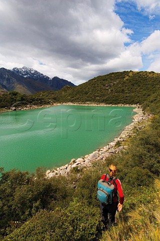 Hiker on the Blue Lakes Walk Tasman Valley Mt CookAoraki National Park South Island New Zealand