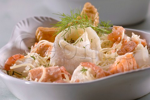 Mixed fish and seafood on spaghetti