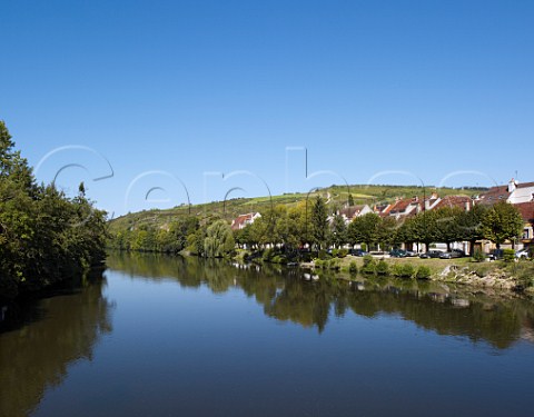 River Yonne at Vincelottes with in distance vineyards on the Col de Crmant above Bailly Yonne France Cte dAuxerre