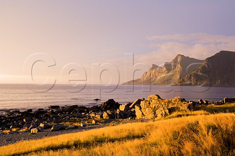 Sunset at coast near Ramberg Lofoten Islands Norway