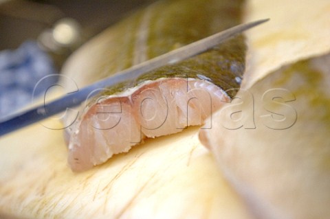 Slicing a fish fillet