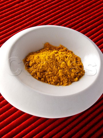Dish of turmeric spice