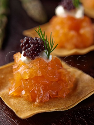 Smoked salmon tartare with caviar entre