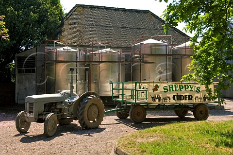 Tourist tractor and trailer at Sheppys Cider Orchard near Taunton Somerset England