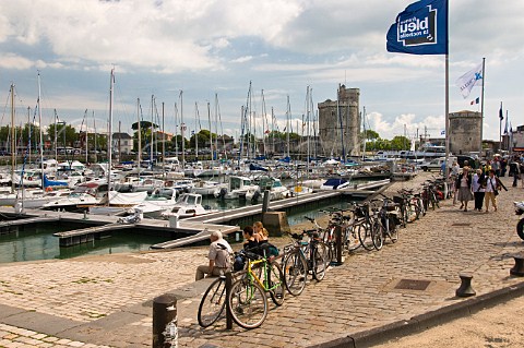 Bicycles parked next to the marina in the ancient port of La Rochelle CharenteMaritime France