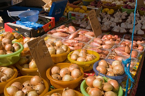 Onions on sale at the Sunday market in LIslesurlaSorgue Vaucluse Provence France