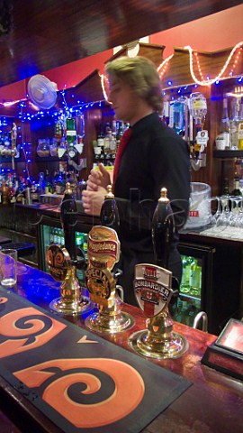 Real ale beer pumps on a typical pub bar London England