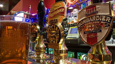 Real ale beer pumps on a typical pub bar  London England