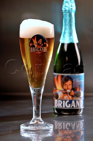 Glass and bottle of Brigand Belgian beer