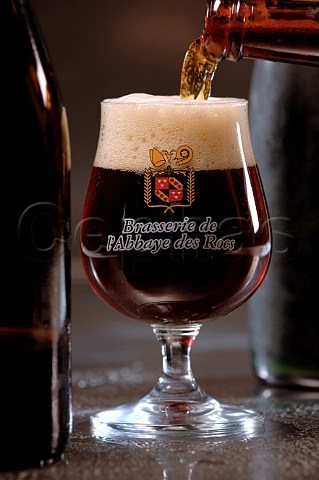 Pouring glass of Brasserie de lAbbaye des Rocs Belgian beer