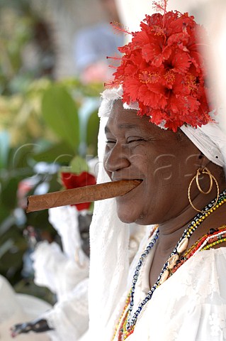 Woman smoking large Cuban cigar Havana Cuba