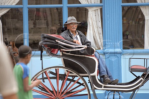 Horse and carriage owner waiting for custom  Havana Cuba