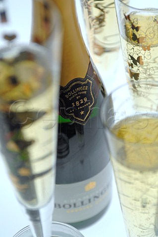 Glasses and bottle of Bollinger champagne