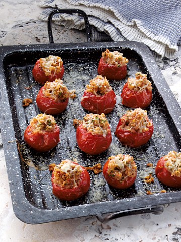 Stuffed tomatoes in a baking dish