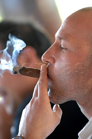 Man smoking a cigar Havana Cuba
