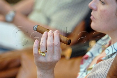 Smoking a Cuban cigar