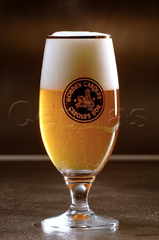 Glass of Gouden Carolus Belgian beer