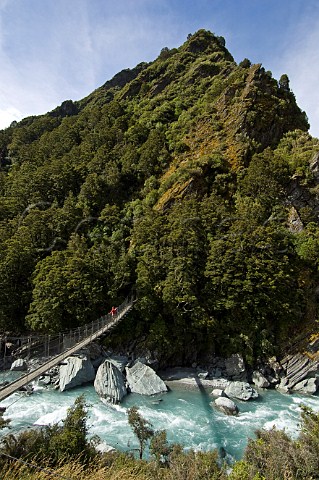Suspension bridge over Matukituki River West Branch South Island New Zealand
