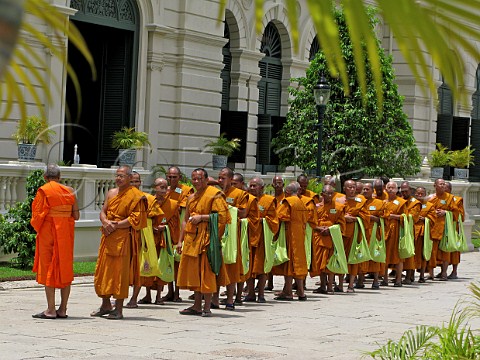 Buddhist monks at Wat Phra Kaeo Temple of the Emerald Buddha Grand Palace Bangkok Thailand