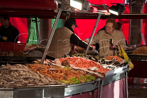 Seafood stall at the Peschera Rialto fish market San Polo Venice Italy
