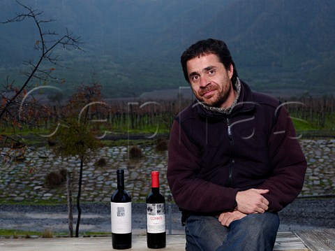 Antonio Bravo winemaker of Emiliana with bottles of his G and Coyam wines Colchagua Valley Chile