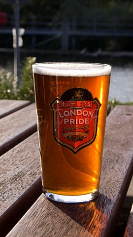 Pint of London Pride in the beer garden of the Weir pub WaltononThames Surrey England