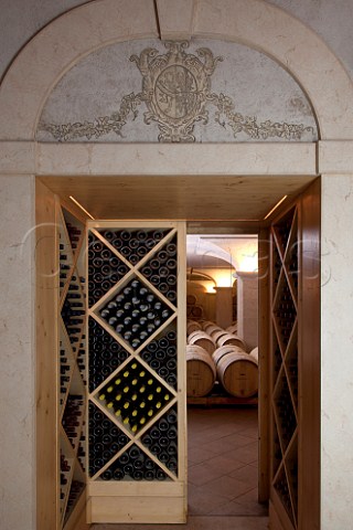 Bottles and barrels in cellar of San Leonardo Borghetto allAdige Avio Trentino Italy