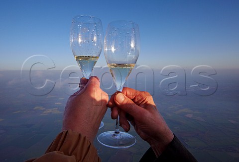 Glasses of Champagne at around 7000 feet in the Taittinger hotair balloon during their altitudinal Champagne tasting to research the affect of altitude on the taste and bubbles