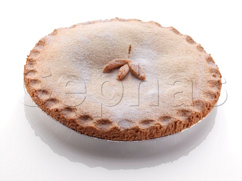 A whole apple pie on a white background