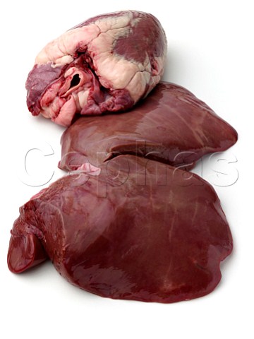 Raw liver and heart on a white background