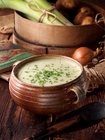 A bowl of leek and potato soup with home grown vegetables