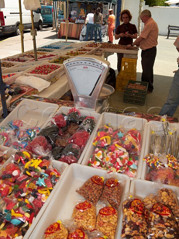 Bags of nuts and sweets for sale on market stall El Bosque Sierra de Cdiz Andaluca Spain